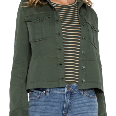 PEPLUM HEM TRUCKER JACKET IN MOSS GREEN